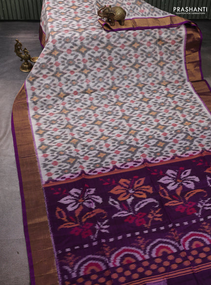 Ikat silk cotton saree off white and purple with allover ikat weaves and zari woven border