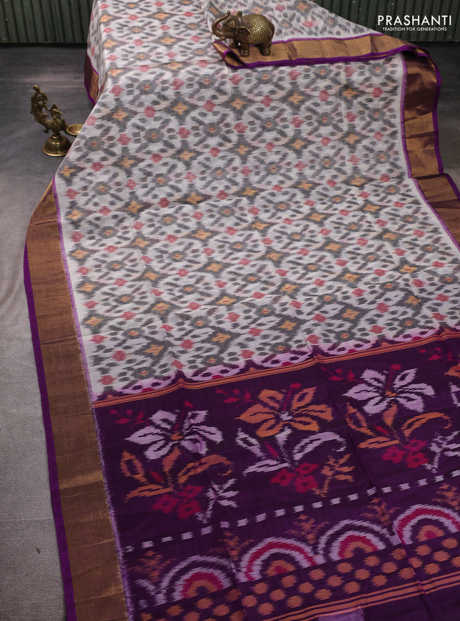 Ikat silk cotton saree off white and purple with allover ikat weaves and zari woven border