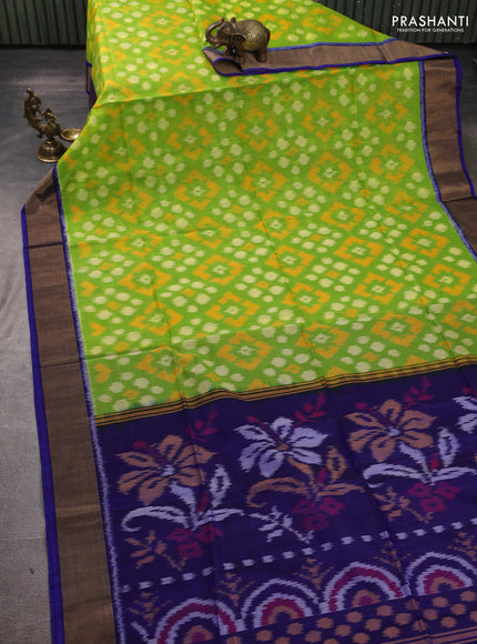 Ikat silk cotton saree light green and royal blue with allover ikat woven buttas and zari woven border