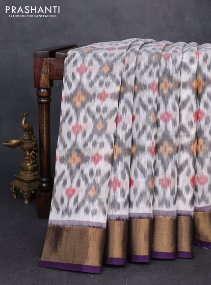 Ikat silk cotton saree grey and deep violet with allover ikat weaves and zari woven border