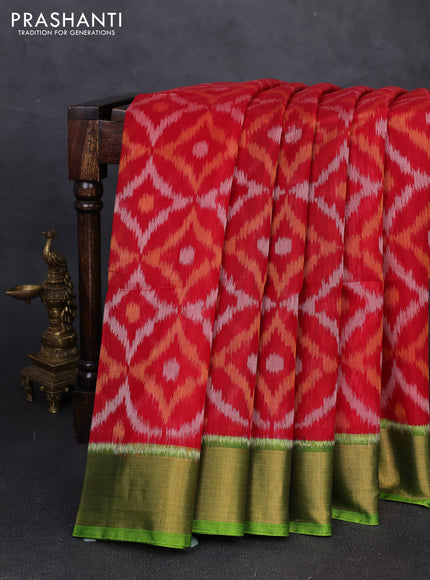 Ikat silk cotton saree red and light green with allover ikat weaves and zari woven border