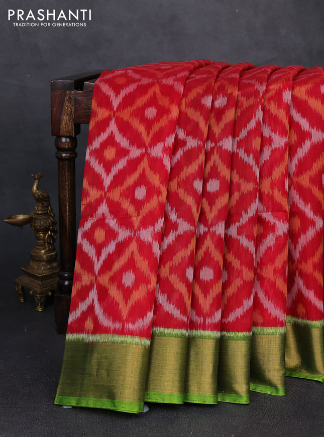 Ikat silk cotton saree red and light green with allover ikat weaves and zari woven border