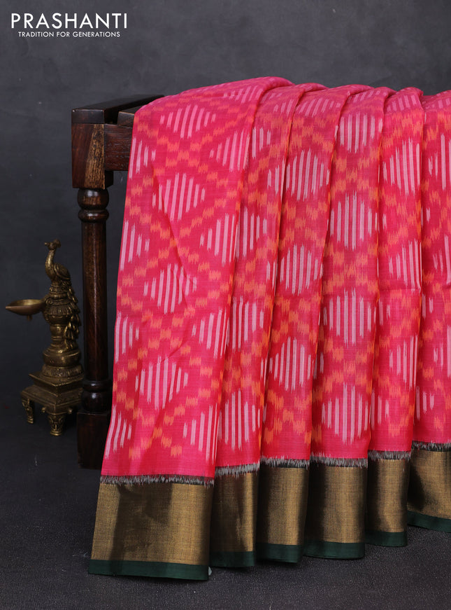 Ikat silk cotton saree pink and bottle green with allover ikat weaves and zari woven border