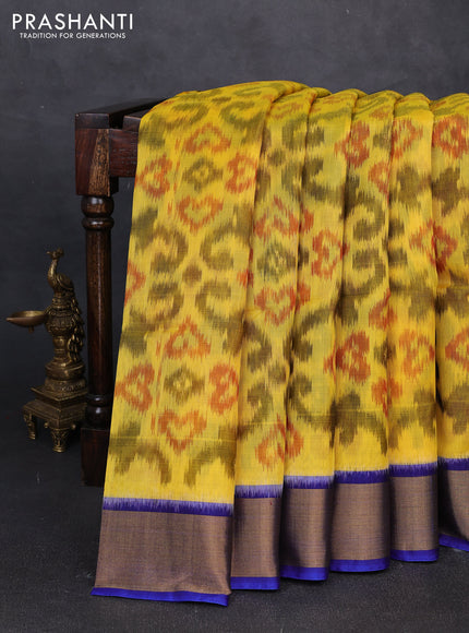 Ikat silk cotton saree light green and royal blue with allover ikat weaves and zari woven border