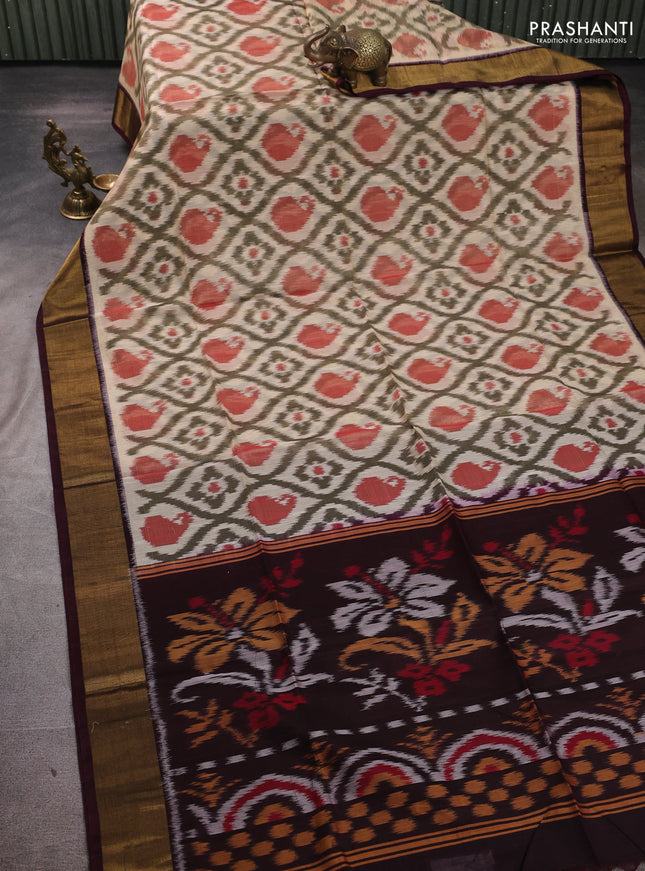 Ikat silk cotton saree beige maroon and deep wine shade with allover ikat weaves and zari woven border