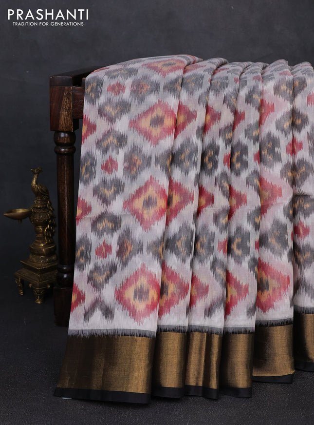 Ikat silk cotton saree grey and black with allover ikat weaves and zari woven border