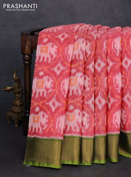 Ikat silk cotton saree red shade and light green with allover ikat weaves and zari woven border