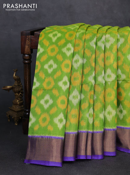Ikat silk cotton saree light green and violet with allover ikat weaves and zari woven border