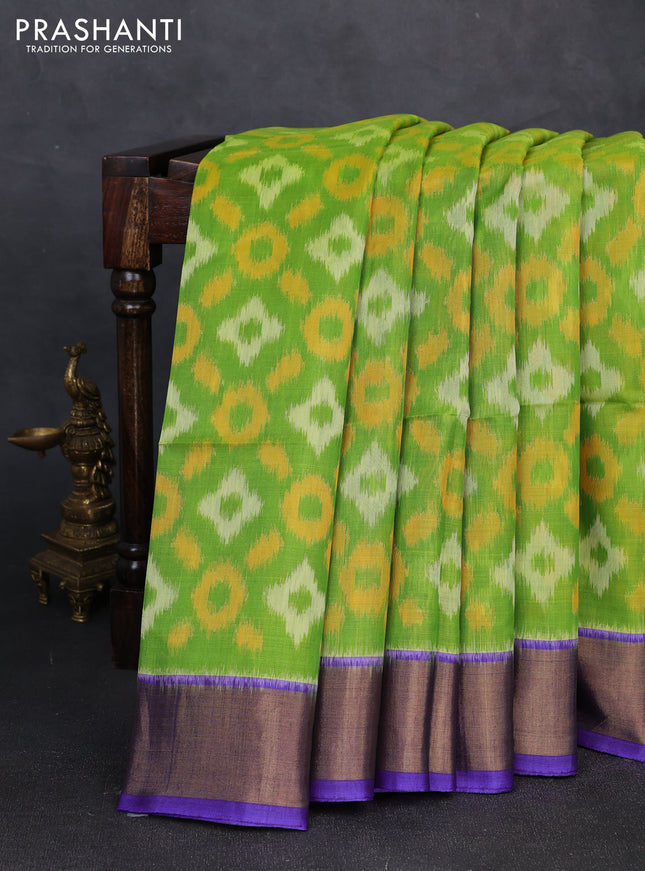 Ikat silk cotton saree light green and violet with allover ikat weaves and zari woven border