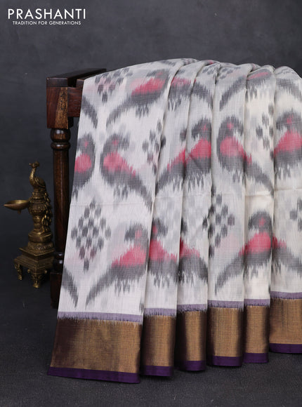 Ikat silk cotton saree grey and violet with allover ikat weaves and zari woven border
