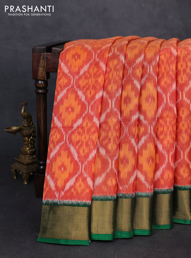Ikat silk cotton saree orange maroon and green with allover ikat weaves and zari woven border