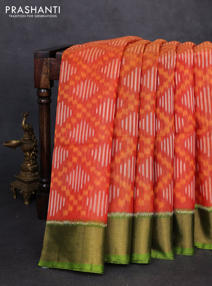 Ikat silk cotton saree orange red and light green with allover ikat weaves and zari woven border