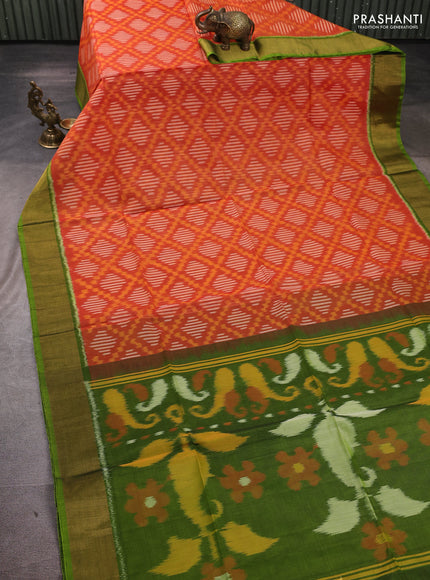 Ikat silk cotton saree orange red and light green with allover ikat weaves and zari woven border