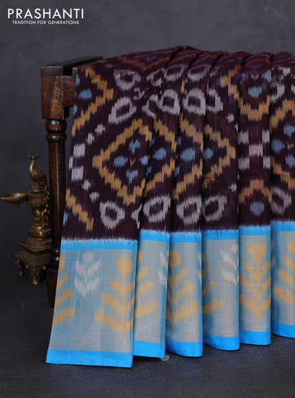 Ikat silk cotton saree coffee brown and cs blue with allover ikat weaves and long zari woven border