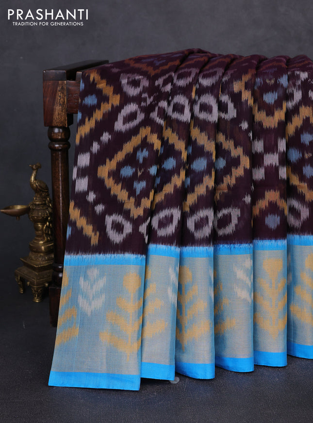 Ikat silk cotton saree coffee brown and cs blue with allover ikat weaves and long zari woven border