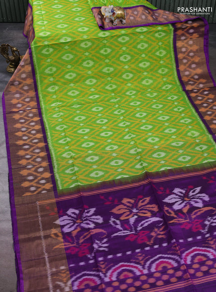 Ikat silk cotton saree light green and purple with allover ikat weaves and long zari woven border