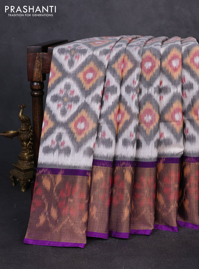 Ikat silk cotton saree off white grey and purple with allover ikat weaves and long zari woven border