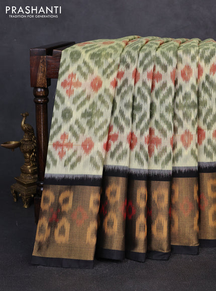 Ikat silk cotton saree green off white and black with allover ikat weaves and long zari woven border