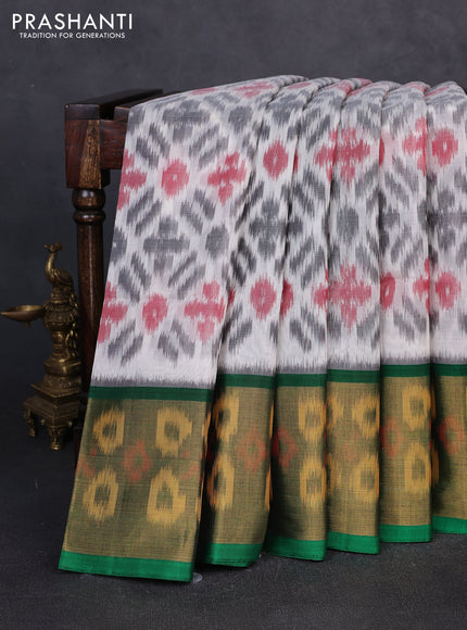 Ikat silk cotton saree off white and green with allover ikat weaves and long zari woven border