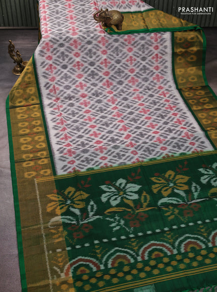 Ikat silk cotton saree off white and green with allover ikat weaves and long zari woven border