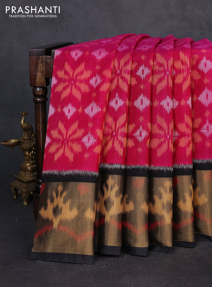 Ikat silk cotton saree pink and black with allover ikat weaves and long zari woven border