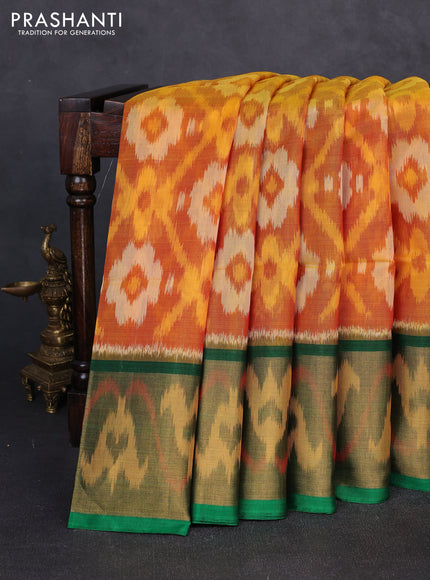Ikat silk cotton saree mustard yellow and green with allover ikat weaves and long zari woven border