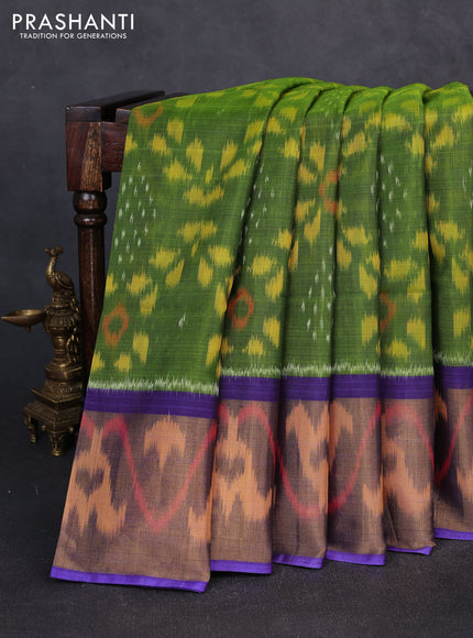 Ikat silk cotton saree light green and blue with allover ikat weaves and long zari woven border