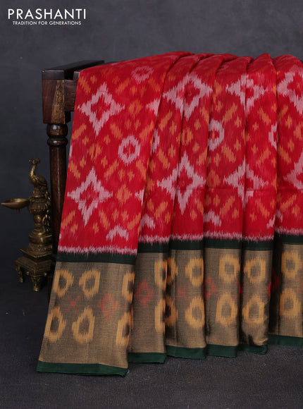 Ikat silk cotton saree red and bottle green with allover ikat weaves and long zari woven border