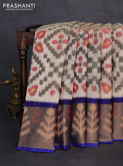 Ikat silk cotton saree off white red and blue with allover ikat weaves and long zari woven border