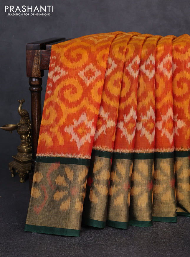 Ikat silk cotton saree orange and green with allover ikat weaves and long zari woven border