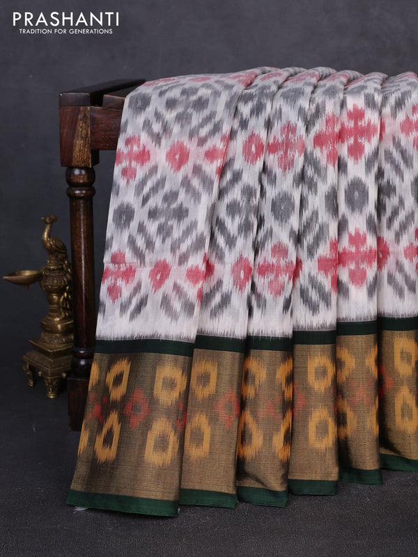 Ikat silk cotton saree off white and bottle green with allover ikat weaves and long zari woven border