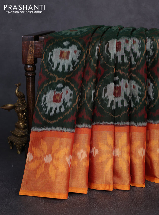 Ikat silk cotton saree bottle green and orange with allover ikat weaves and long zari woven border