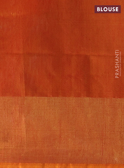 Ikat silk cotton saree bottle green and orange with allover ikat weaves and long zari woven border