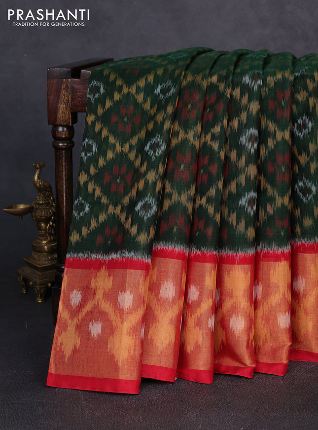 Ikat silk cotton saree bottle green and red with allover ikat weaves and long zari woven border