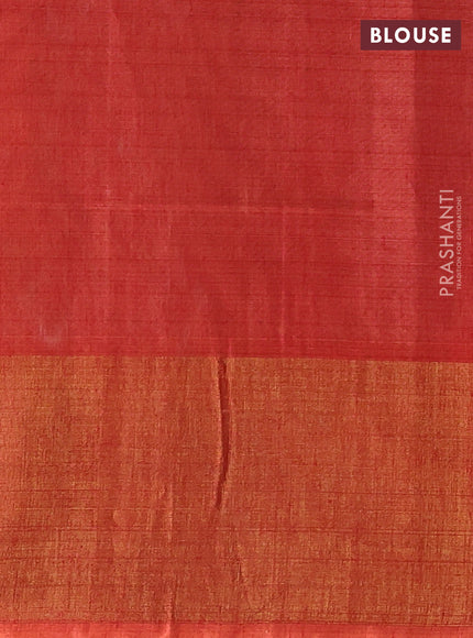 Ikat silk cotton saree bottle green and orange with allover ikat weaves and long zari woven border