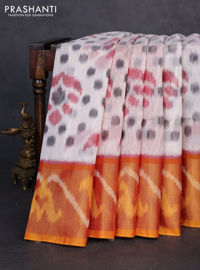 Ikat silk cotton saree off white and orange with allover ikat weaves and long zari woven border