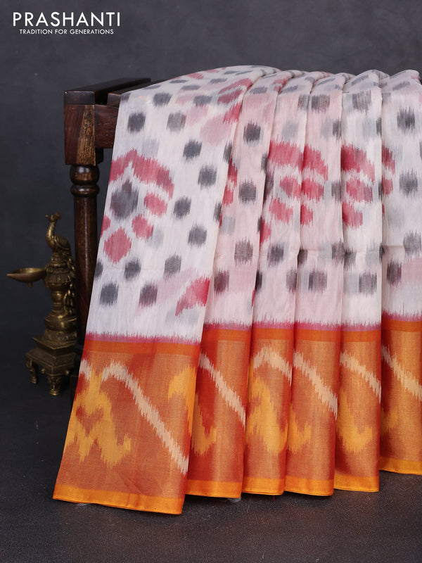 Ikat silk cotton saree off white and orange with allover ikat weaves and long zari woven border