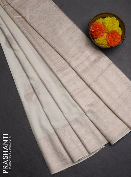 Semi chanderi saree off white with zari woven buttas and zari woven border