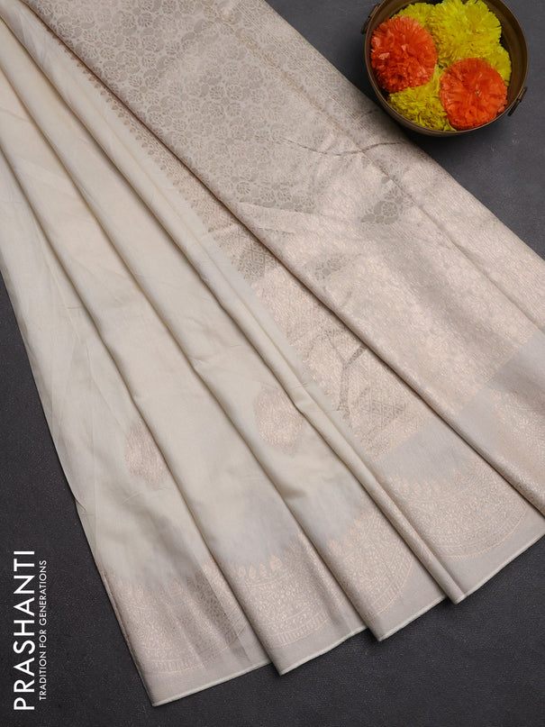 Semi chanderi saree off white with alllover zari woven buttas and zari woven border