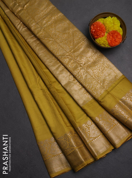 Semi chanderi saree mustard yellow with allover self emboss & zari buttas and zari woven border