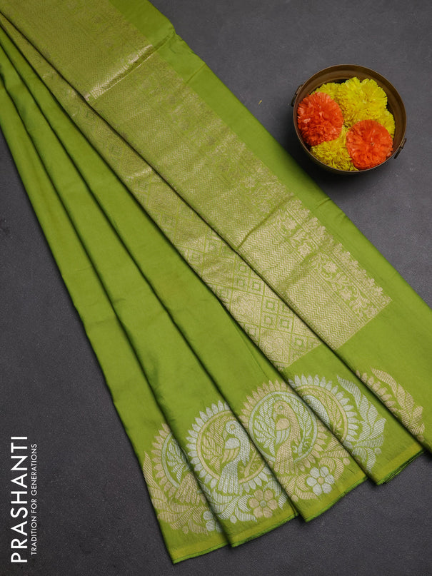 Semi chanderi saree light green with plain body and zari woven border