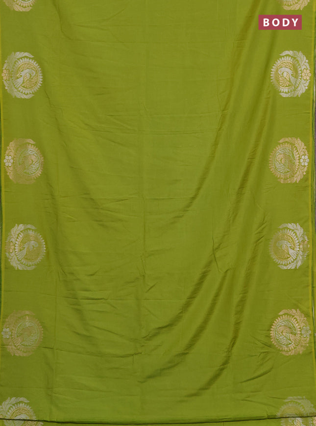 Semi chanderi saree light green with plain body and zari woven border