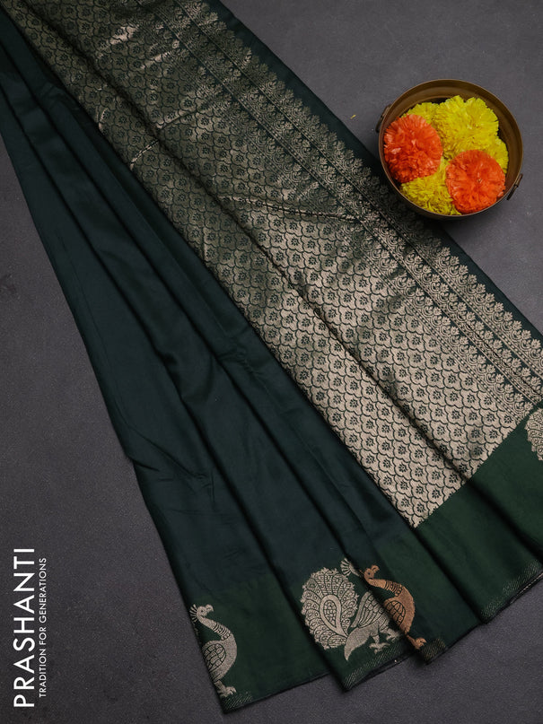 Semi chanderi saree bottle green with plain body and zari woven border