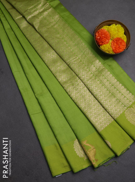 Semi chanderi saree light green with plain body and zari woven border