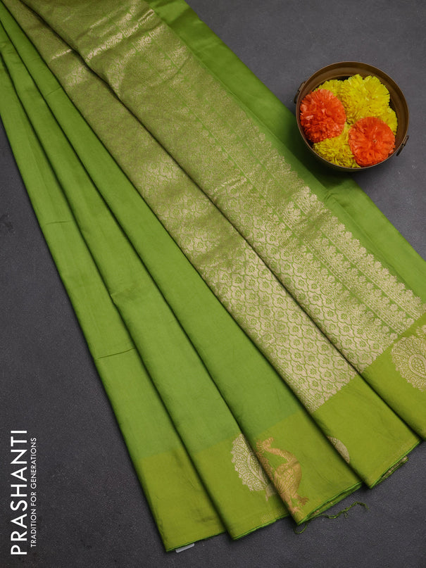 Semi chanderi saree light green with plain body and zari woven border
