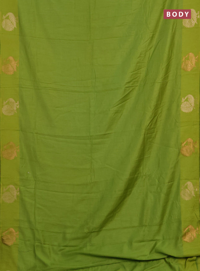 Semi chanderi saree light green with plain body and zari woven border