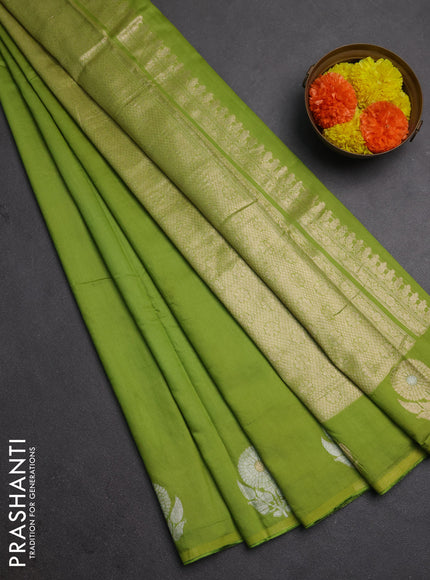 Semi chanderi saree light green with plain body and zari woven border