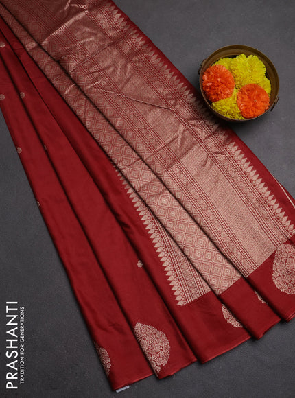 Semi chanderi saree maroon with allover zari woven buttas and zari woven butta border