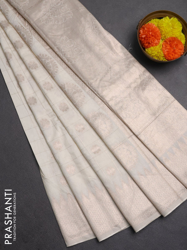 Semi chanderi saree off white with allover zari checks & buttas and zari woven border
