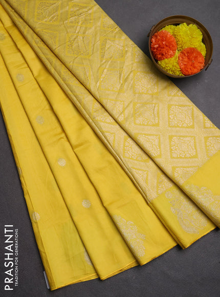 Semi chanderi saree yellow with allover zari woven buttas and zari woven butta border